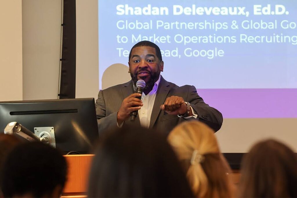 An alum addresses a group of EdD students during their January residency.
